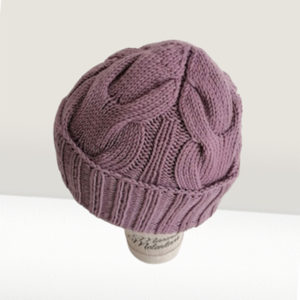 Knitted hat with lapel and braids 